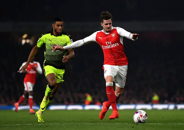 LONDON, ENGLAND - OCTOBER 25: Carl Jenkinson of Arsenal (R) is chased by Dominic Samuel of Reading (L) during the EFL Cup fourth round match between Arsenal and Reading at Emirates Stadium on October 25, 2016 in London, England.  (Photo by Michael Regan/Getty Images)