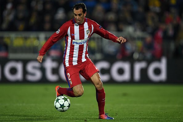 Atletico Madrid's Uruguayan defender Diego Godin controls the ball during the UEFA Champions League football match between FC Rostov and Club Atletico de Madrid in Rostov-on-Don on October 19, 2016. / AFP / Kirill KUDRYAVTSEV        (Photo credit should read KIRILL KUDRYAVTSEV/AFP/Getty Images)