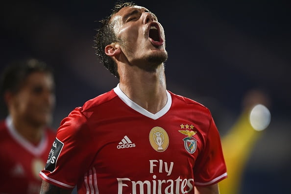 Benfica's Spanish defender Alex Grimaldo celebrates a goal during the Portuguese league football match between OS Belenenses and SL Benfica at the Restelo stadium in Lisbon on October 23, 2016. / AFP / PATRICIA DE MELO MOREIRA        (Photo credit should read PATRICIA DE MELO MOREIRA/AFP/Getty Images)