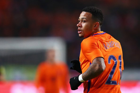 AMSTERDAM, NETHERLANDS - NOVEMBER 09:  Memphis Depay of the Netherlands in action during the international friendly match between Netherlands and Belgium at Amsterdam Arena on November 9, 2016 in Amsterdam, Netherlands.  (Photo by Dean Mouhtaropoulos/Getty Images)
