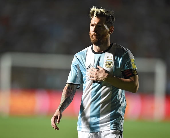 Argentina's Lionel Messi gestures during their 2018 FIFA World Cup qualifier football match against Colombia in San Juan, Argentina, on November 15, 2016. / AFP / EITAN ABRAMOVICH        (Photo credit should read EITAN ABRAMOVICH/AFP/Getty Images)