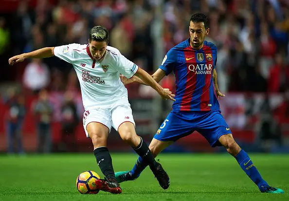 SEVILLE, SPAIN - NOVEMBER 06:  Samir Nasri of Sevilla FC (L) being followed by Sergio Busquets of FC Barcelona (R) during the match between Sevilla FC vs FC Barcelona as part of La Liga at Ramon Sanchez Pizjuan Stadium on November 6, 2016 in Seville, Spain.  (Photo by Aitor Alcalde/Getty Images)