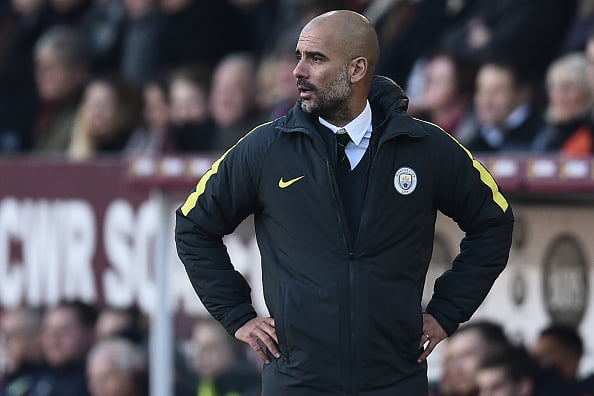 Manchester City's Spanish manager Pep Guardiola gestures on the touchline during the English Premier League football match between Burnley and Manchester City at Turf Moor in Burnley, north west England on November 26, 2016. / AFP / Oli SCARFF / RESTRICTED TO EDITORIAL USE. No use with unauthorized audio, video, data, fixture lists, club/league logos or 'live' services. Online in-match use limited to 75 images, no video emulation. No use in betting, games or single club/league/player publications.  /         (Photo credit should read OLI SCARFF/AFP/Getty Images)