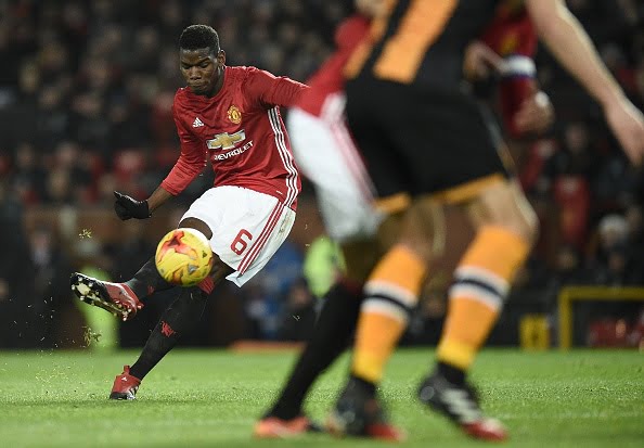 Manchester United's French midfielder Paul Pogba strikes the ball as he takes a free-kick during the EFL (English Football League) Cup semi-final football match between Manchester United and Hull City at Old Trafford in Manchester, north west England on January 10, 2017. (OLI SCARFF/AFP/Getty Images)