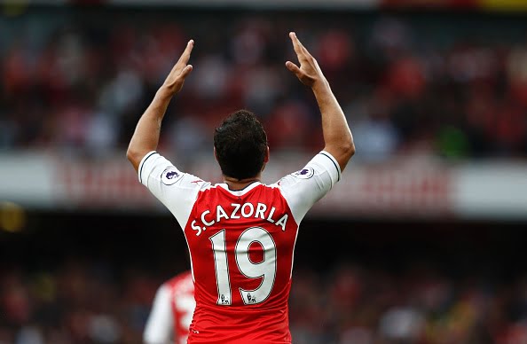 Arsenal's Spanish midfielder Santi Cazorla gestures during the English Premier League football match between Arsenal and Southampton at the Emirates Stadium in London on September 10, 2016. 
Arsenal won the game 2-1. / AFP / Adrian DENNIS / RESTRICTED TO EDITORIAL USE. No use with unauthorized audio, video, data, fixture lists, club/league logos or 'live' services. Online in-match use limited to 75 images, no video emulation. No use in betting, games or single club/league/player publications.  /         (Photo credit should read ADRIAN DENNIS/AFP/Getty Images)