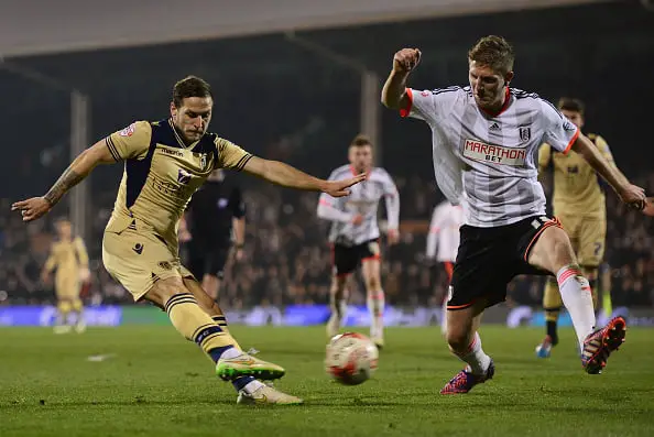 LONDON, ENGLAND - MARCH 18:  Billy Sharp of Leeds United is blocked by Michael Turner of Fulham during the Sky Bet Championship match between Fulham and Leeds United at Craven Cottage on March 18, 2015 in London, England.  (Photo by Jamie McDonald/Getty Images)