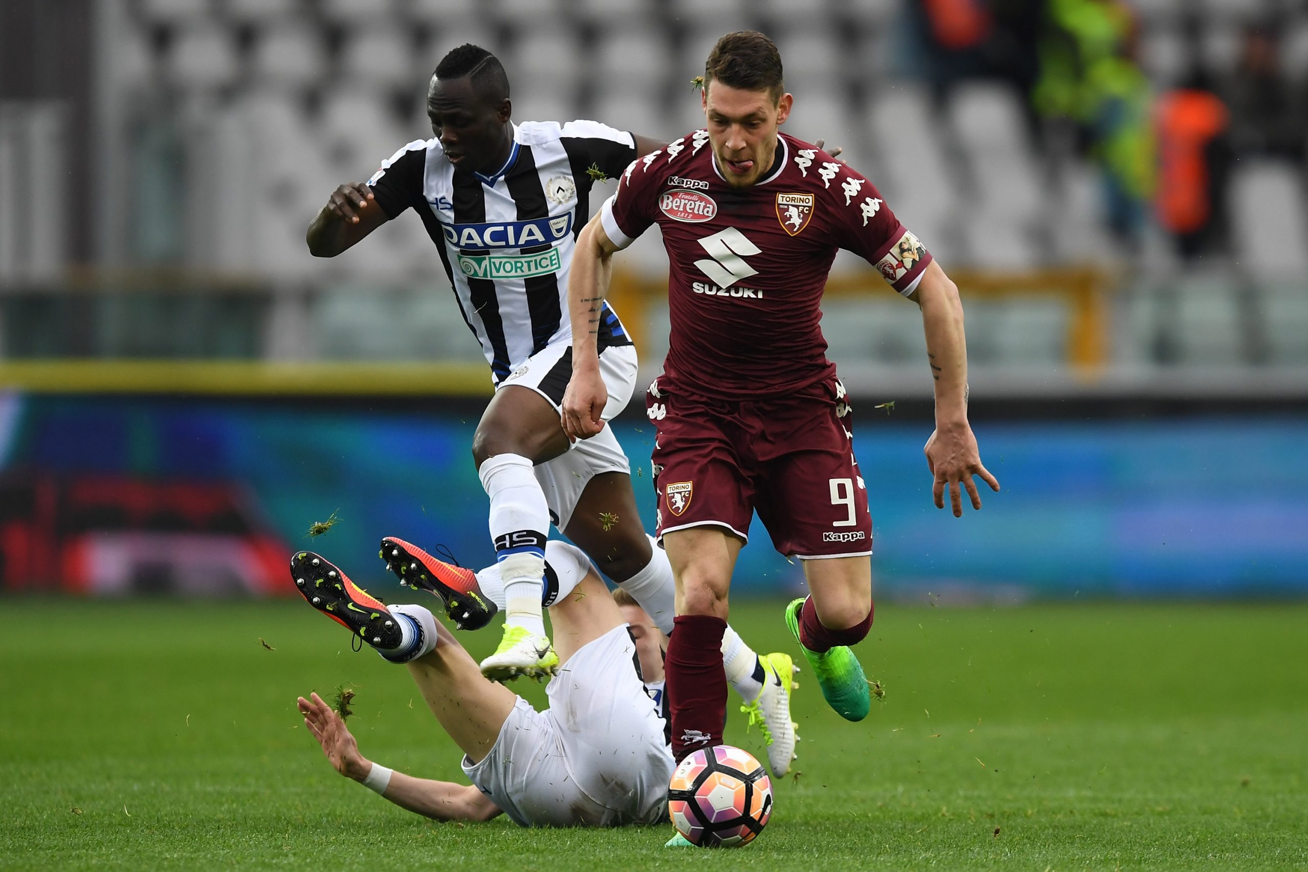 Andrea Belotti (R) of FC Torino in action against Emmanuel Badu (R) and Jakub Jankto of Udinese Calcio during the Serie A match between FC Torino and Udinese Calcio at Stadio Olimpico di Torino on April 2, 2017 in Turin, Italy.  (Photo by Valerio Pennicino/Getty Images)