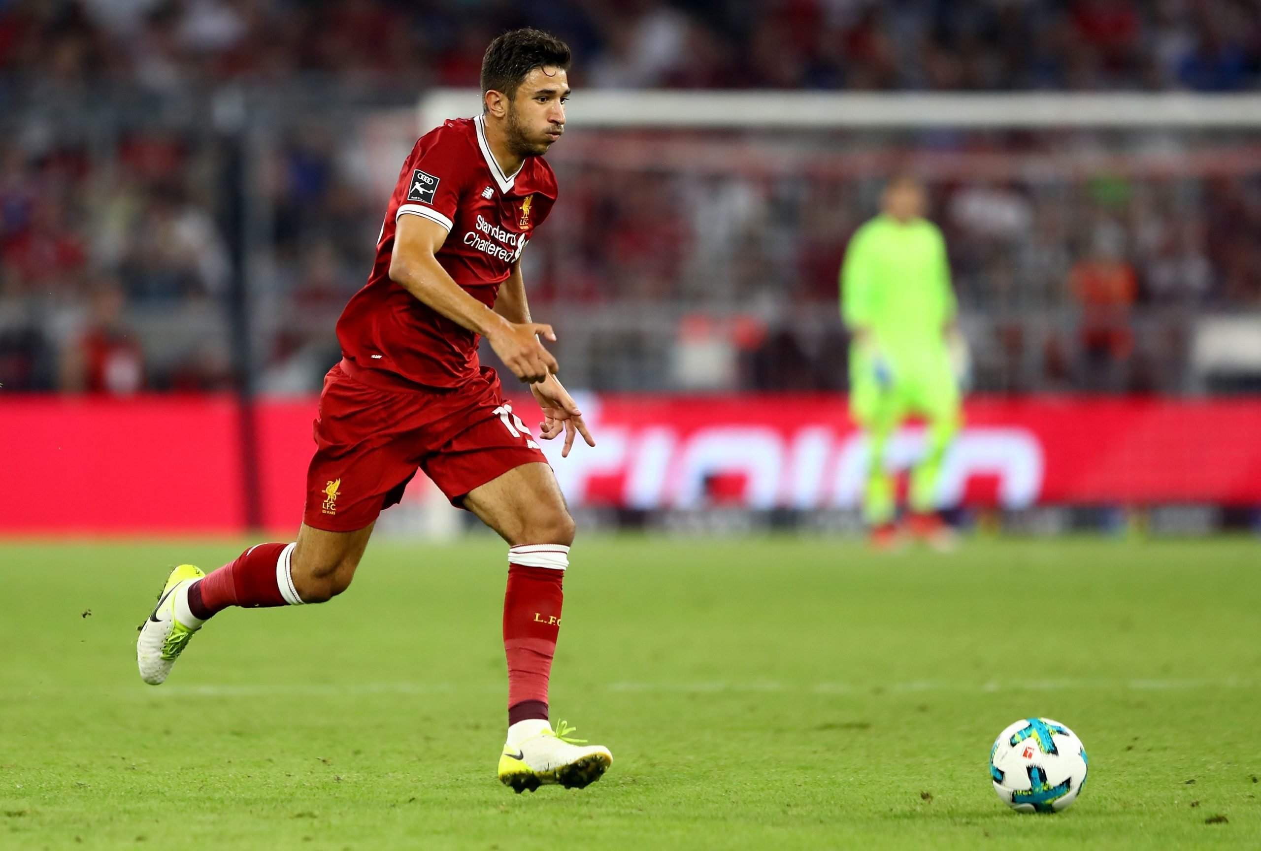 Marko Grujic of Liverpool runs with the ball during the Audi Cup 2017 match between Liverpool FC and Atletico Madrid at Allianz Arena on August 2, 2017 in Munich, Germany.  (Photo by Martin Rose/Bongarts/Getty Images)