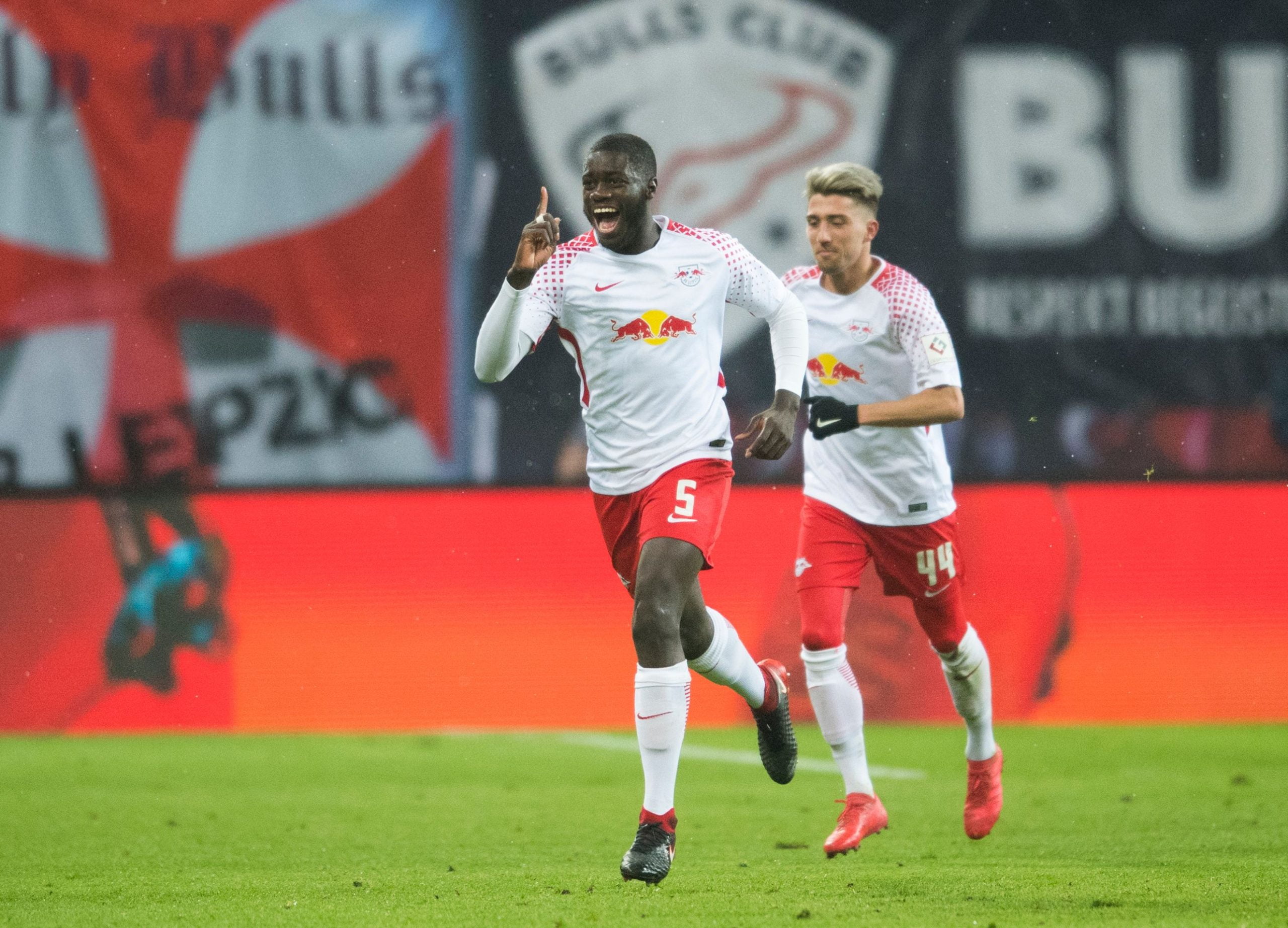 Leipzig´s French defender Dayot Upamecano celebrates scoring during the German first division Bundesliga football match between RB Leipzig and FC Augsburg in Leipzig, eastern Germany on February 9, 2018.  / AFP PHOTO / ROBERT MICHAEL        (Photo credit should read ROBERT MICHAEL/AFP/Getty Images)