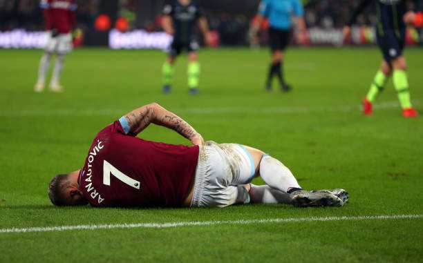 LONDON, ENGLAND - NOVEMBER 24: Marko Arnautovic of West Ham United lies injured during the Premier League match between West Ham United and Manchester City at London Stadium on November 24, 2018 in London, United Kingdom. (Photo by Catherine Ivill/Getty Images)
