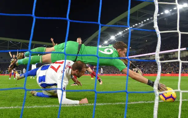 BRIGHTON, ENGLAND - DECEMBER 26:  Bernd Leno of Arsenal saves the ball on the goal line during the Premier League match between Brighton & Hove Albion and Arsenal FC at American Express Community Stadium on December 26, 2018 in Brighton, United Kingdom.  (Photo by Mike Hewitt/Getty Images)
