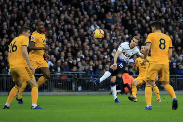 Harry Kane of Tottenham Hotspur scores his team's first goal during the Premier League match between Tottenham Hotspur and Wolverhampton Wanderers at Tottenham Hotspur Stadium on December 29, 2018 in London, United Kingdom.  (Photo by Marc Atkins/Getty Images)
