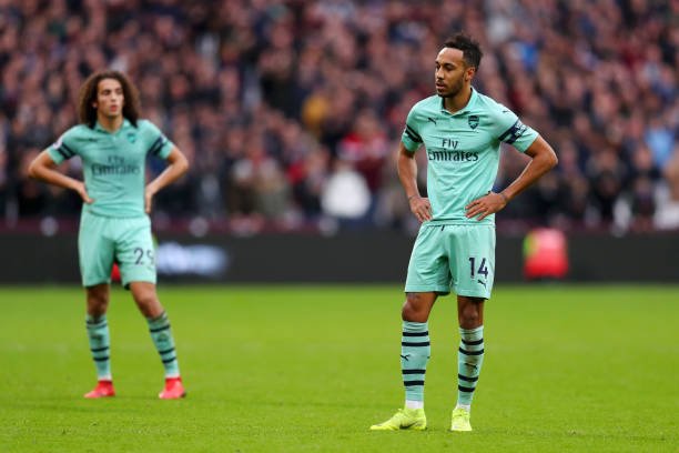 Pierre-Emerick Aubameyang of Arsenal and Matteo Guendouzi of Arsenal look dejected during the Premier League match between West Ham United and Arsenal FC at London Stadium on January 12, 2019 in London, United Kingdom.  (Photo by Catherine Ivill/Getty Images)