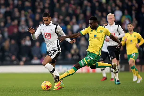 Derby, ENGLAND- November 26: Max Lowe of Derby County and Alexander Tettey of Norwich City in action during the Sky Bet Championship match between Derby County and Norwich City at iPro Stadium on November 26, 2016 in Derby, England. (Photo by Nathan Stirk/Getty Images)