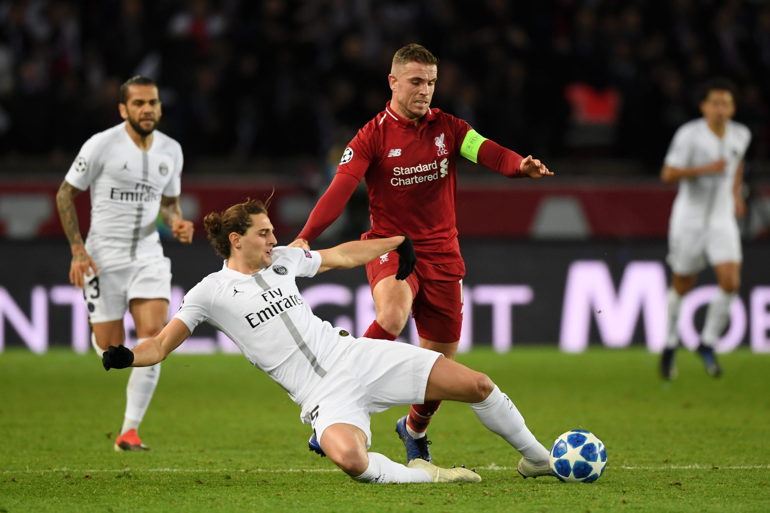 Adrien Rabiot of Paris Saint-Germain battles for possession with Jordan Henderson of Liverpool  during the UEFA Champions League Group C match between Paris Saint-Germain and Liverpool at Parc des Princes on November 28, 2018 in Paris, France.  (Photo by Shaun Botterill/Getty Images)