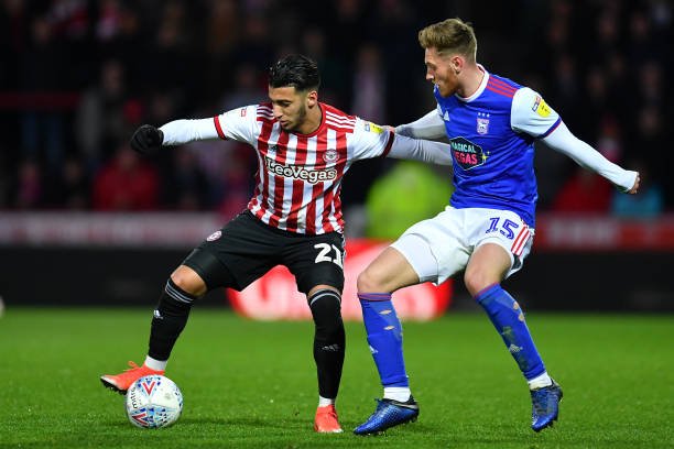 BRENTFORD, ENGLAND - APRIL 10:  Said Benrahma of Brentford holds off Teddy Bishop of Ipswich Town during the Sky Bet Championship match between Brentford and Ipswich Town at Griffin Park on April 10, 2019 in Brentford, England. (Photo by Justin Setterfield/Getty Images)