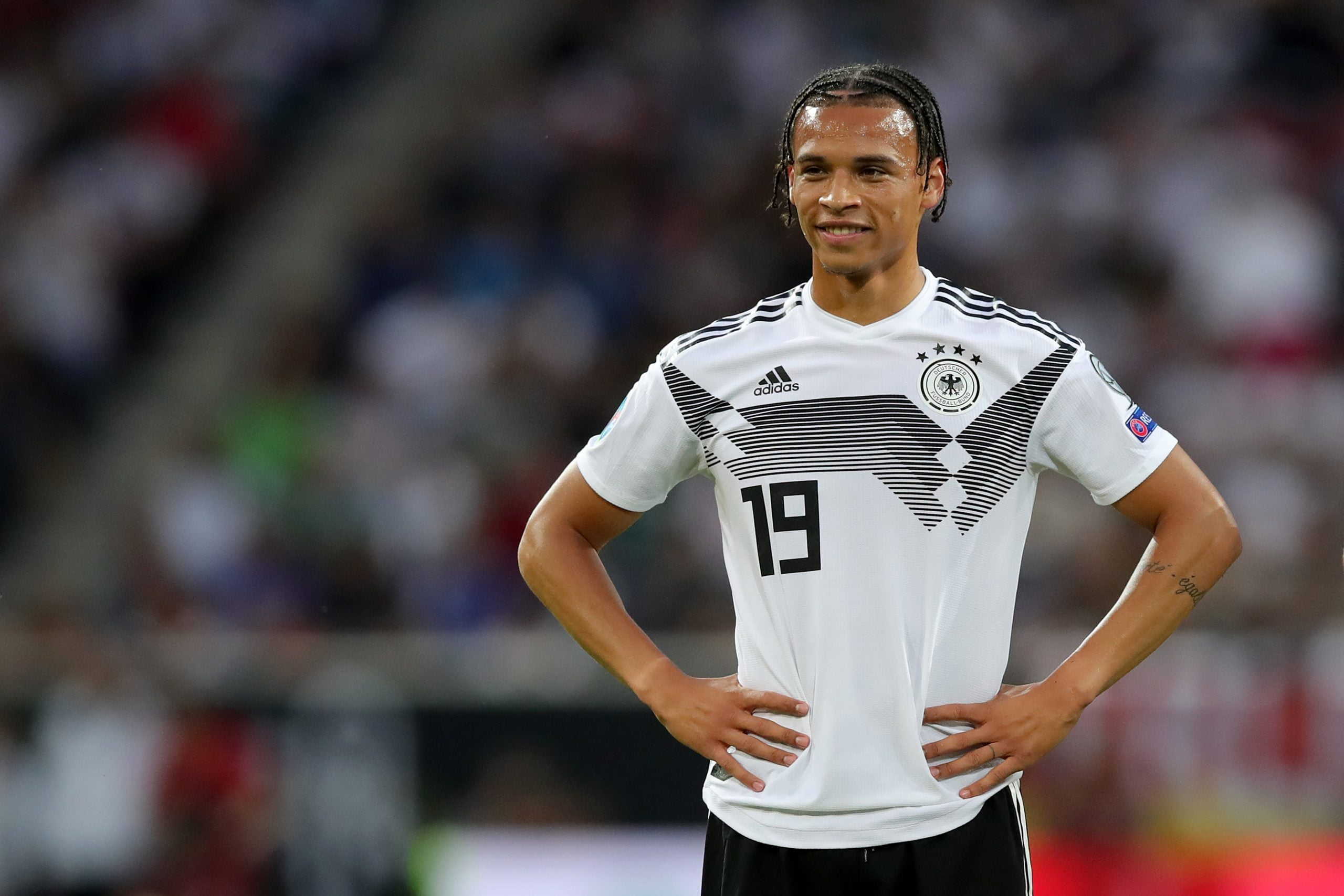 Leroy Sane of Germany smiles during the UEFA Euro 2020 Qualifier match between Germany and Estonia at Opel Arena on June 11, 2019 in Mainz, Germany. (Photo by Alexander Hassenstein/Bongarts/Getty Images)