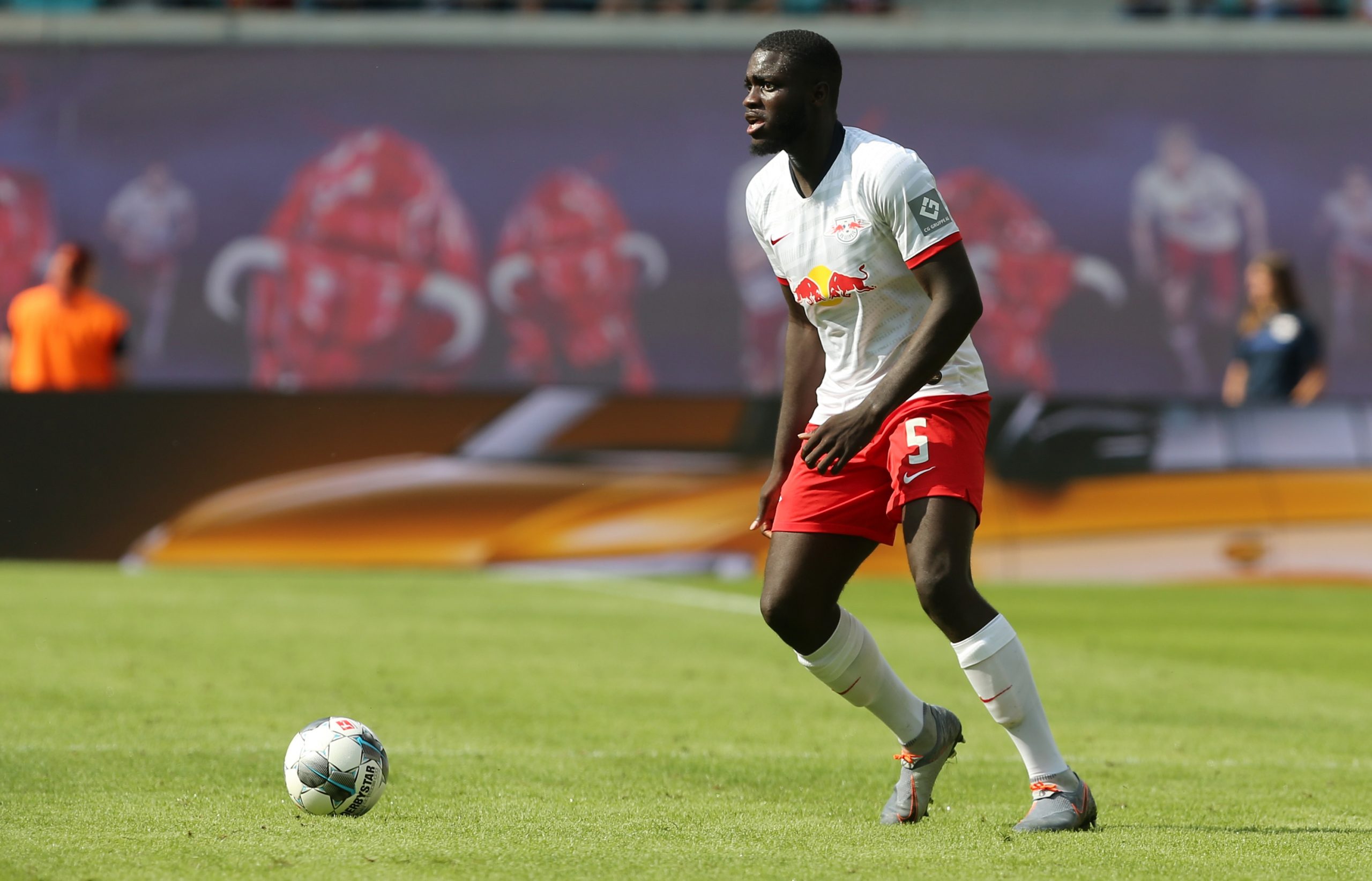 Dayot Upamecano of Leipzig runs with the ball during the pre-season friendly match between RB Leipzig and Aston Villa at Red Bull Arena on August 3, 2019 in Leipzig, Germany.  (Photo by Matthias Kern/Bongarts/Getty Images)