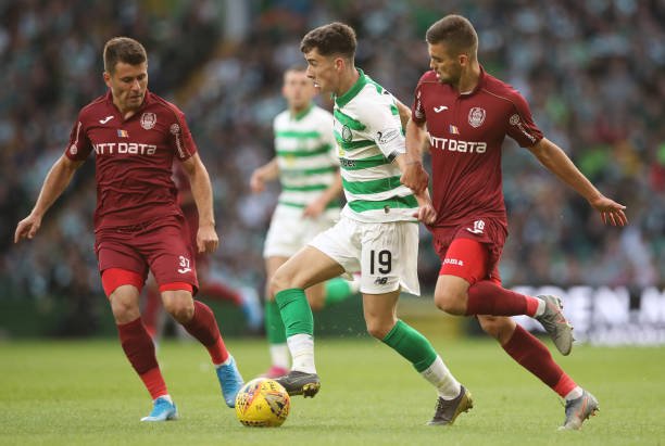 GLASGOW, SCOTLAND - AUGUST 13: Mikey Johnston of Celtic vies with Mateo Susic of CFR Cluj during the UEFA Champions League, third qualifying round, second leg match between Celtic and CFR Cluj at Celtic Park on August 13, 2019 in Glasgow, Scotland. (Photo by Ian MacNicol/Getty Images)