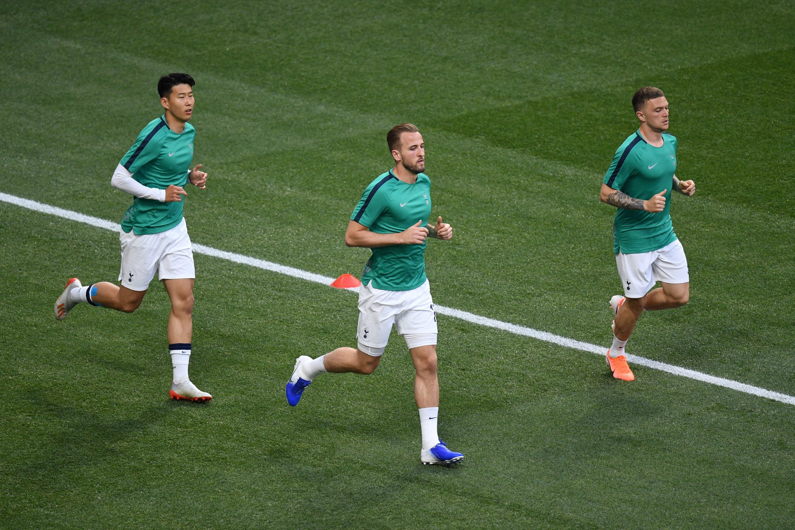 Harry Kane, Heung-Min Son and Kieran Trippier of Tottenham Hotspur warm up prior to the UEFA Champions League Final between Tottenham Hotspur and Liverpool at Estadio Wanda Metropolitano on June 01, 2019 in Madrid, Spain. (Photo by David Ramos/Getty Images)