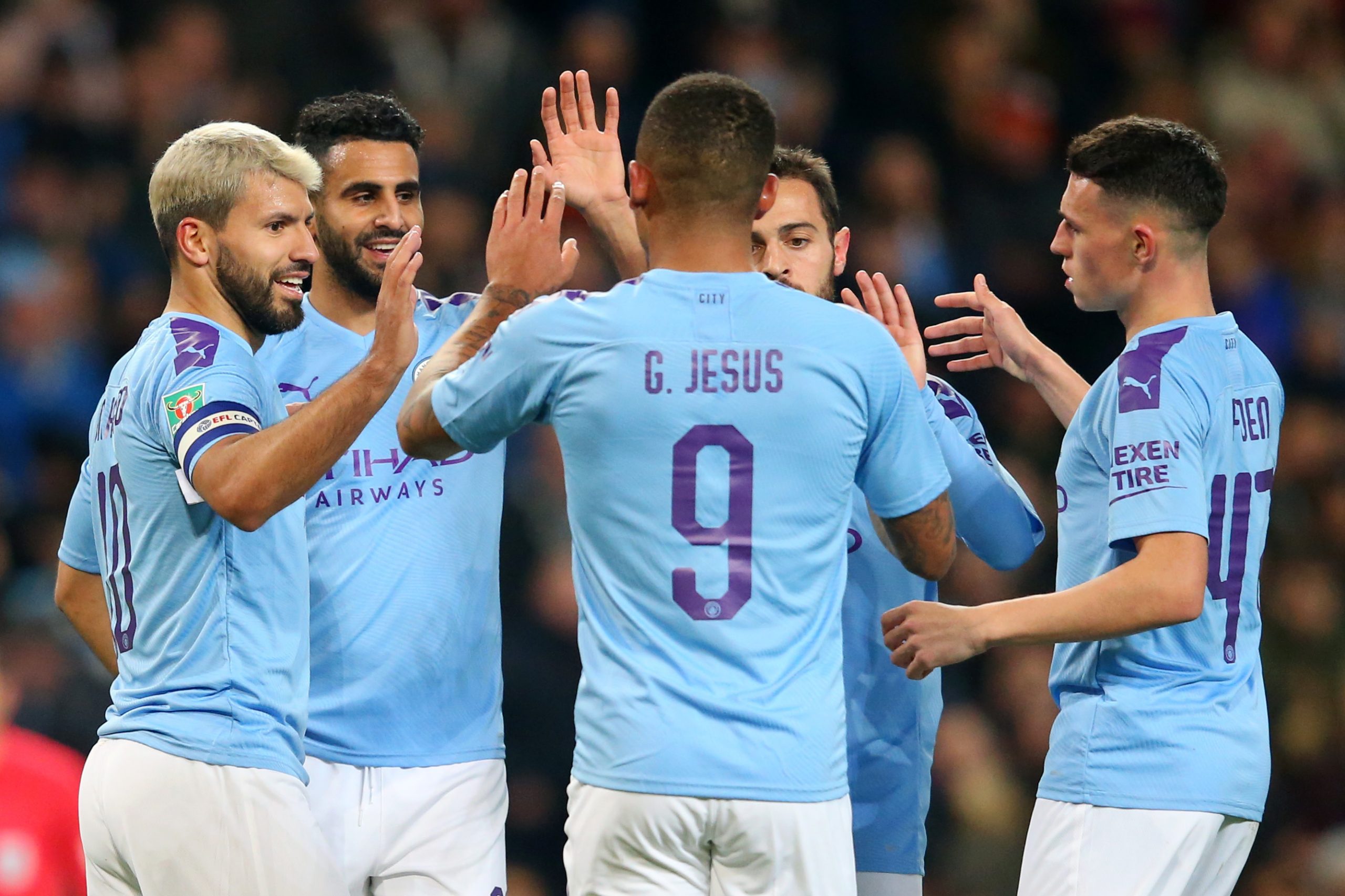 MANCHESTER, ENGLAND - OCTOBER 29: Sergio Aguero of Manchester City celebrates after scoring his team's third goal with Riyad Mahrez, Gabriel Jesus, Bernardo Silva and Phil Foden of Manchester City during the Carabao Cup Round of 16 match between Manchester City and Southampton at Etihad Stadium on October 29, 2019 in Manchester, England. (Photo by Alex Livesey/Getty Images)