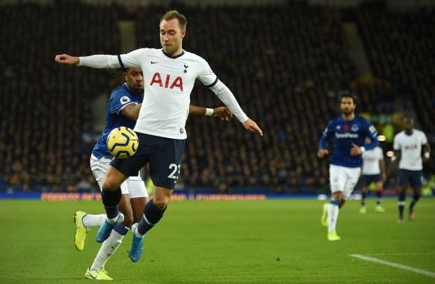Everton's Nigerian midfielder Alex Iwobi (L) vies with Tottenham Hotspur's Danish midfielder Christian Eriksen during the English Premier League football match between Everton and Tottenham Hotspur at Goodison Park in Liverpool, north west England on November 3, 2019. (Photo by Oli SCARFF / AFP) / RESTRICTED TO EDITORIAL USE. No use with unauthorized audio, video, data, fixture lists, club/league logos or 'live' services. Online in-match use limited to 120 images. An additional 40 images may be used in extra time. No video emulation. Social media in-match use limited to 120 images. An additional 40 images may be used in extra time. No use in betting publications, games or single club/league/player publications. /  (Photo by OLI SCARFF/AFP via Getty Images)