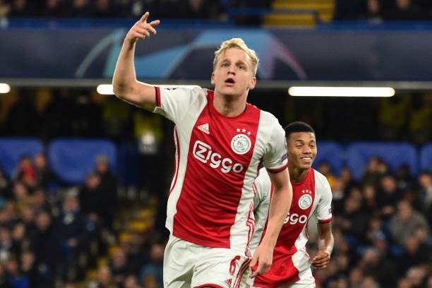 Ajax's Dutch midfielder Donny Van de Beek celebrates after scoring their fourth goal during the UEFA Champion's League Group H football match between Chelsea and Ajax at Stamford Bridge in London on November 5, 2019. (Photo by Glyn KIRK / AFP) (Photo by GLYN KIRK/AFP via Getty Images)