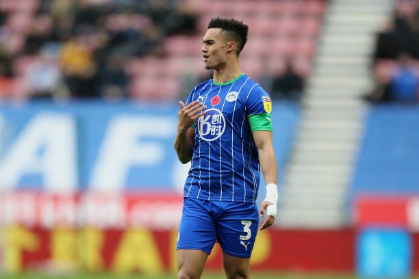 WIGAN, ENGLAND - NOVEMBER 09: Antonee Robinson of Wigan Athletic reacts during the Sky Bet Championship match between Wigan Athletic and Brentford at DW Stadium on November 09, 2019 in Wigan, England. (Photo by Lewis Storey/Getty Images)