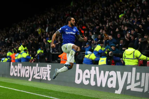 Theo Walcott of Everton celebrates after scoring his team's third goal during the Premier League match between Watford FC and Everton FC at Vicarage Road on February 01, 2020 in Watford, United Kingdom. (Photo by Catherine Ivill/Getty Images)
