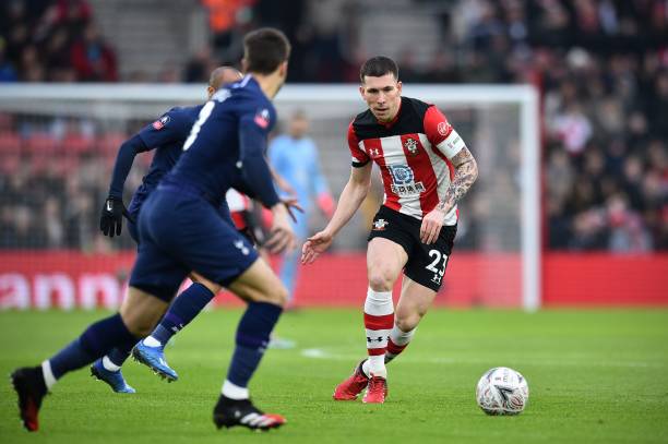 Southampton's Danish midfielder Pierre-Emile Hojbjerg (R) runs with the ball during the English FA Cup fourth round football match between Southampton and Tottenham Hotspur at St Mary's Stadium in Southampton, southern England on January 25, 2020. (Photo by GLYN KIRK/AFP via Getty Images)
