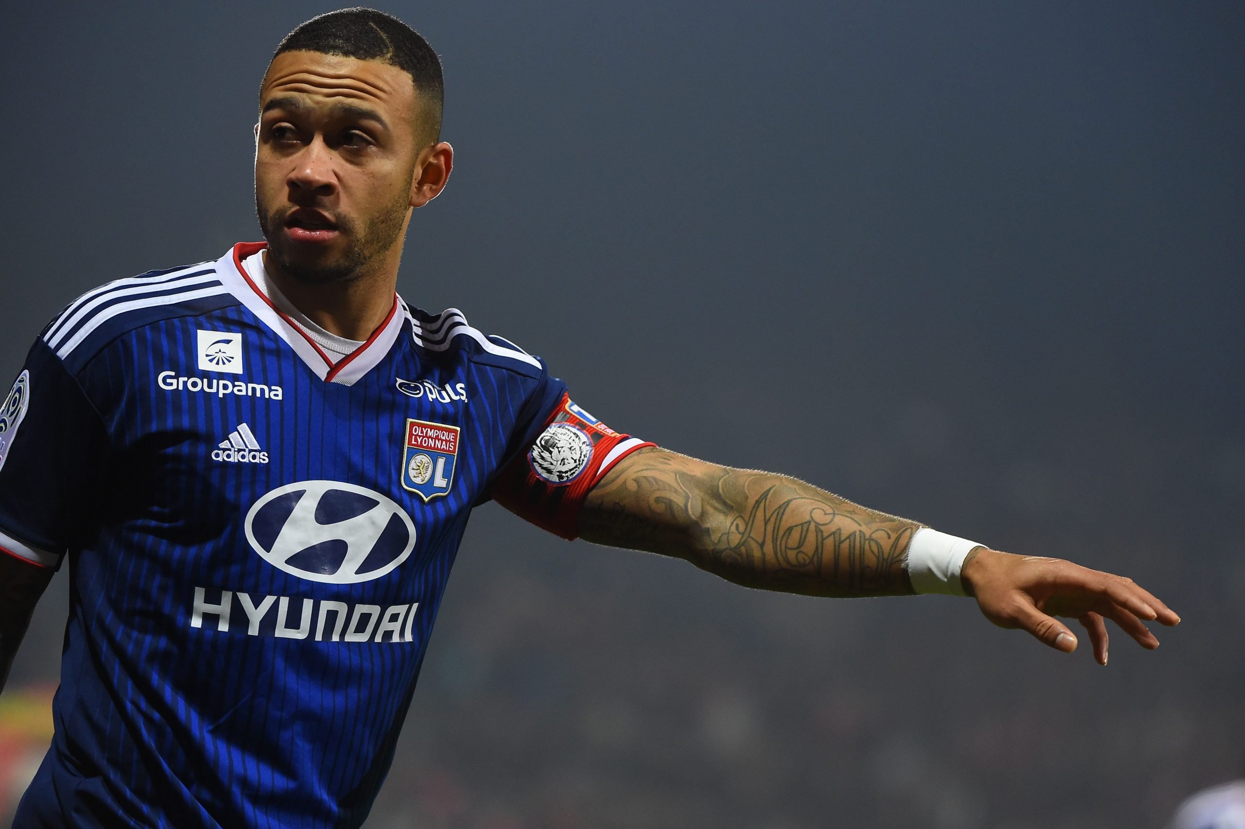 Liverpool will attempt to beat Barcelona for Memphis Depay who is seen in the photo