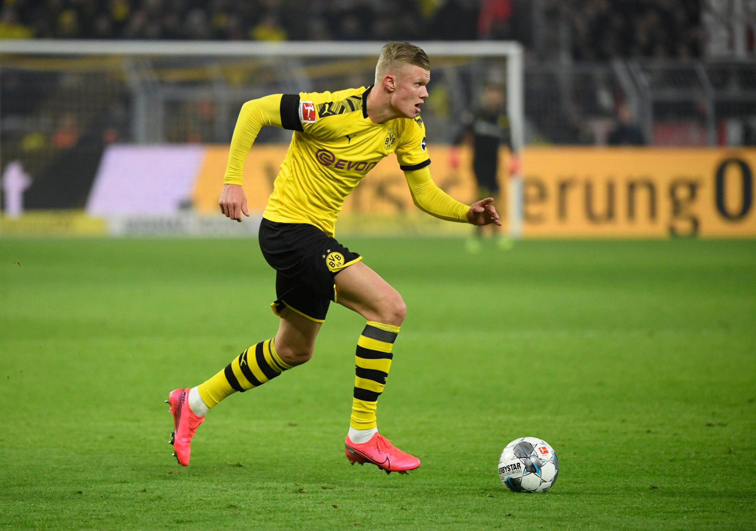 Dortmund's Norwegian forward Erling Braut Haaland runs with the ball during the German first division Bundesliga football match Borussia Dortmund v FC Cologne in Dortmund, on January 24, 2020. (Photo by Ina FASSBENDER / AFP) / DFL REGULATIONS PROHIBIT ANY USE OF PHOTOGRAPHS AS IMAGE SEQUENCES AND/OR QUASI-VIDEO (Photo by INA FASSBENDER/AFP via Getty Images)