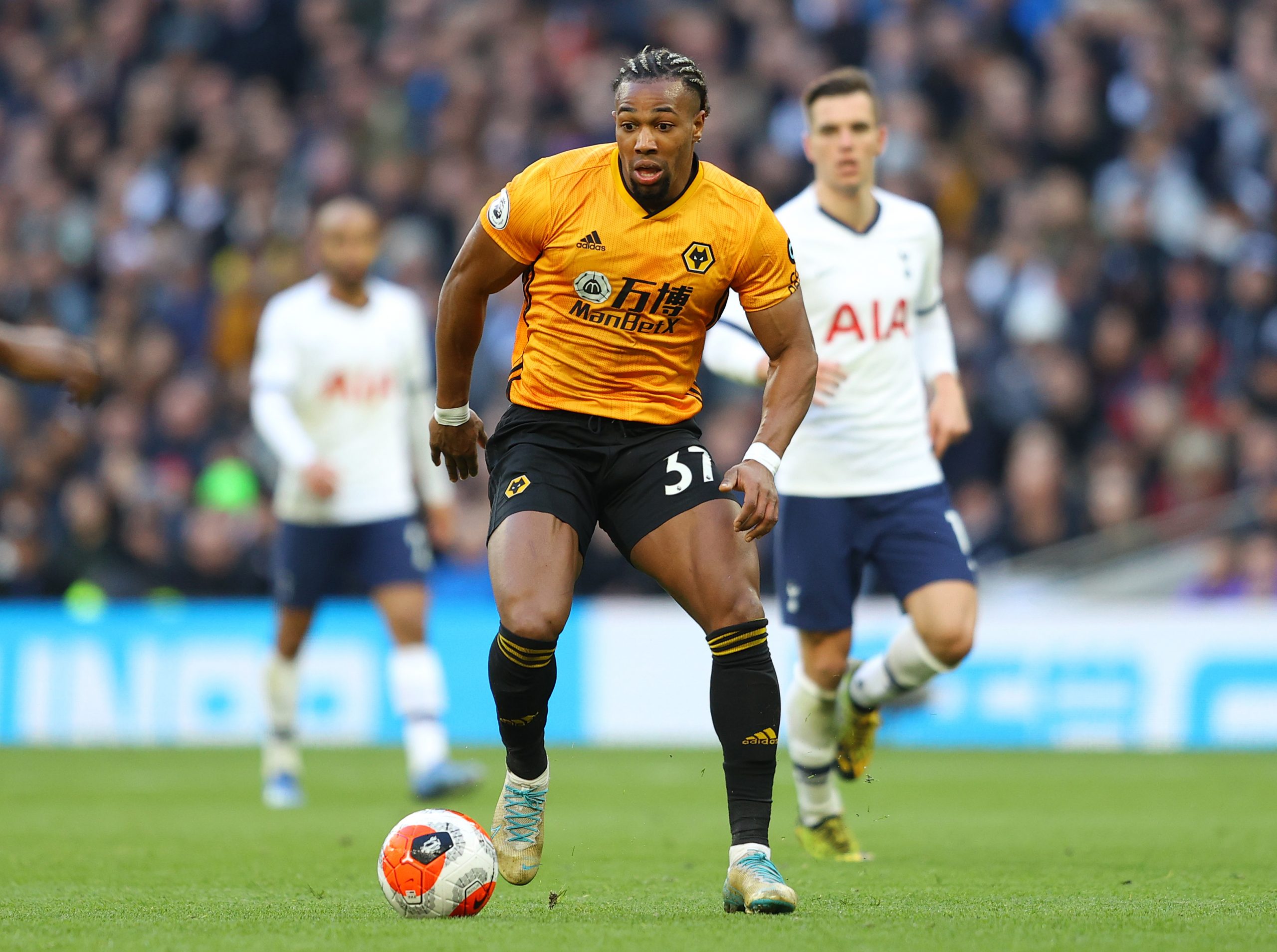 LONDON, ENGLAND - MARCH 01: Adama Traore of Wolverhampton Wanderers in action during the Premier League match between Tottenham Hotspur and Wolverhampton Wanderers at Tottenham Hotspur Stadium on March 01, 2020 in London, United Kingdom. (Photo by Richard Heathcote/Getty Images)