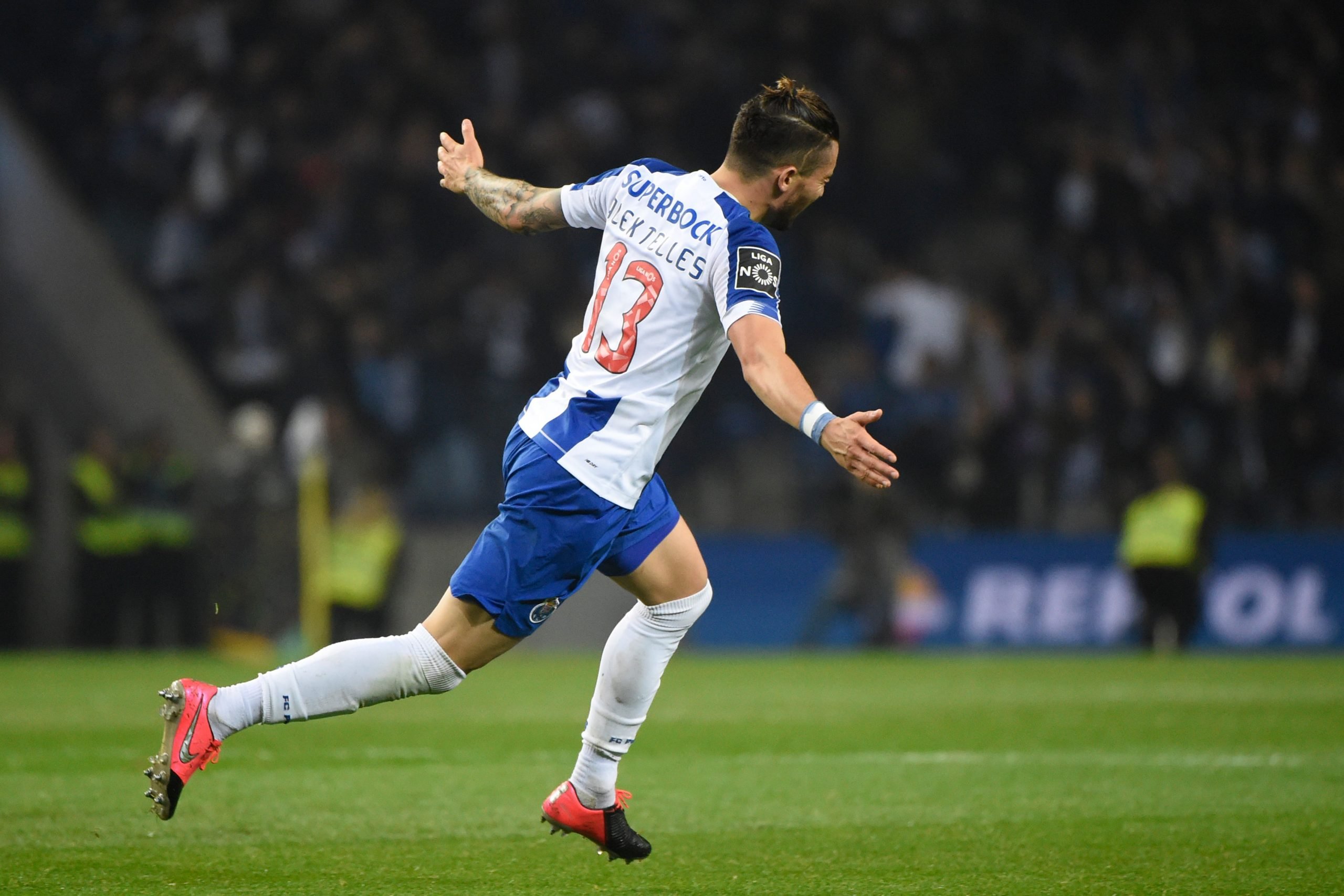 FC Porto's Brazilian defender Alex Telles celebrates after scoring a goal during the Portuguese league football match between FC Porto and Portimonense SC at the Dragao stadium in Porto on February 23, 2020. (Photo by MIGUEL RIOPA/AFP via Getty Images)