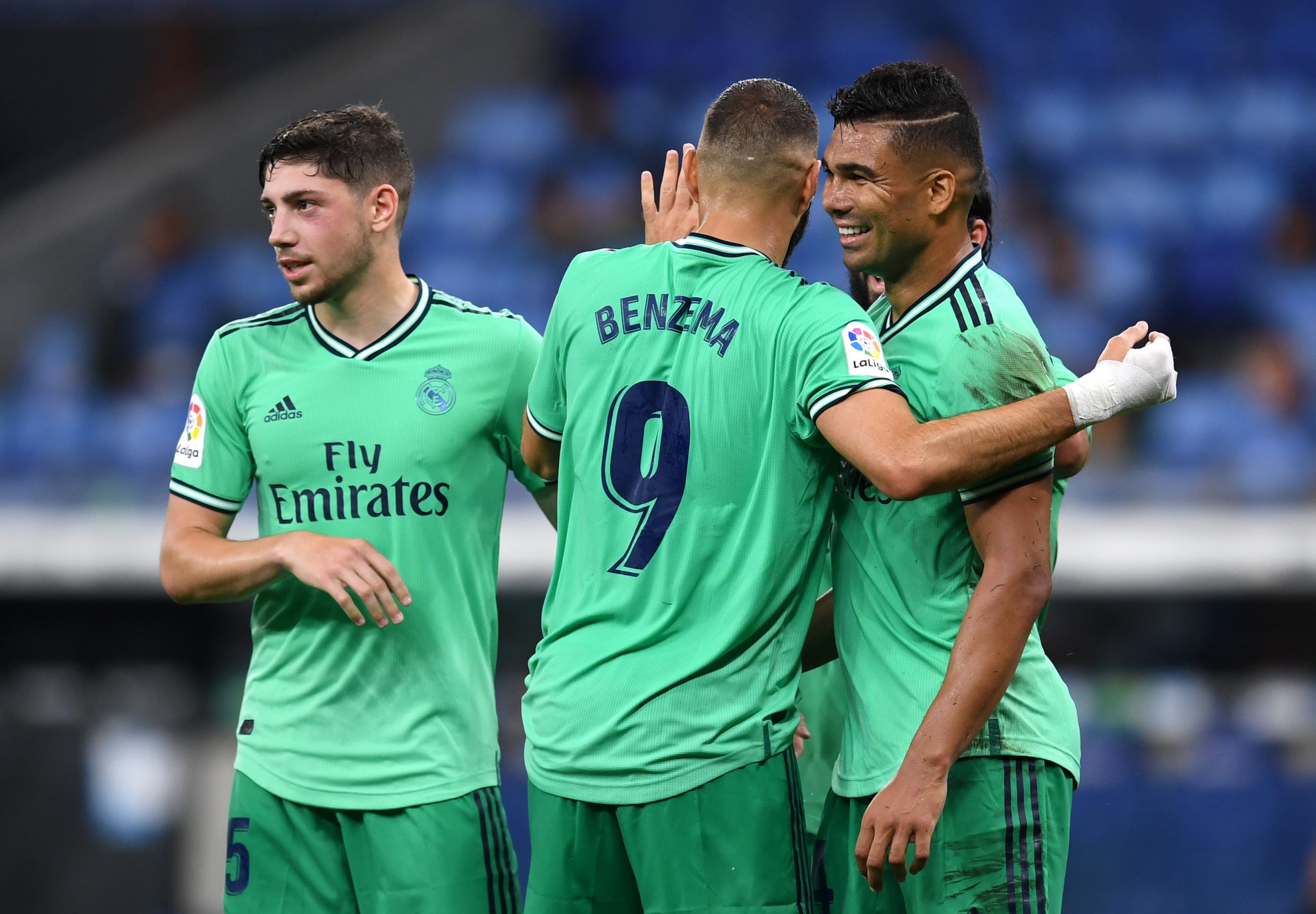 BARCELONA, SPAIN - JUNE 28: Casemiro of Real Madrid celebrates with teammates after scoring his sides first goal during the Liga match between RCD Espanyol and Real Madrid CF at RCDE Stadium on June 28, 2020 in Barcelona, Spain. (Photo by David Ramos/Getty Images)