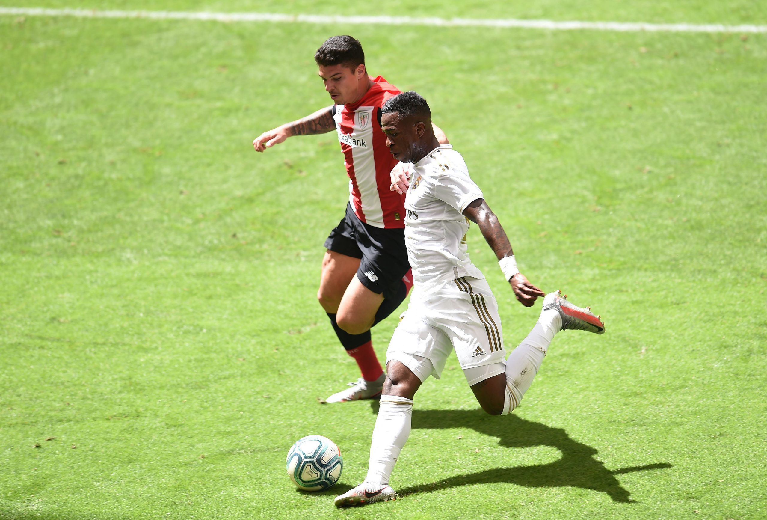 Liverpool eyeing a move for Vinicius Junior who is in action in the picture
