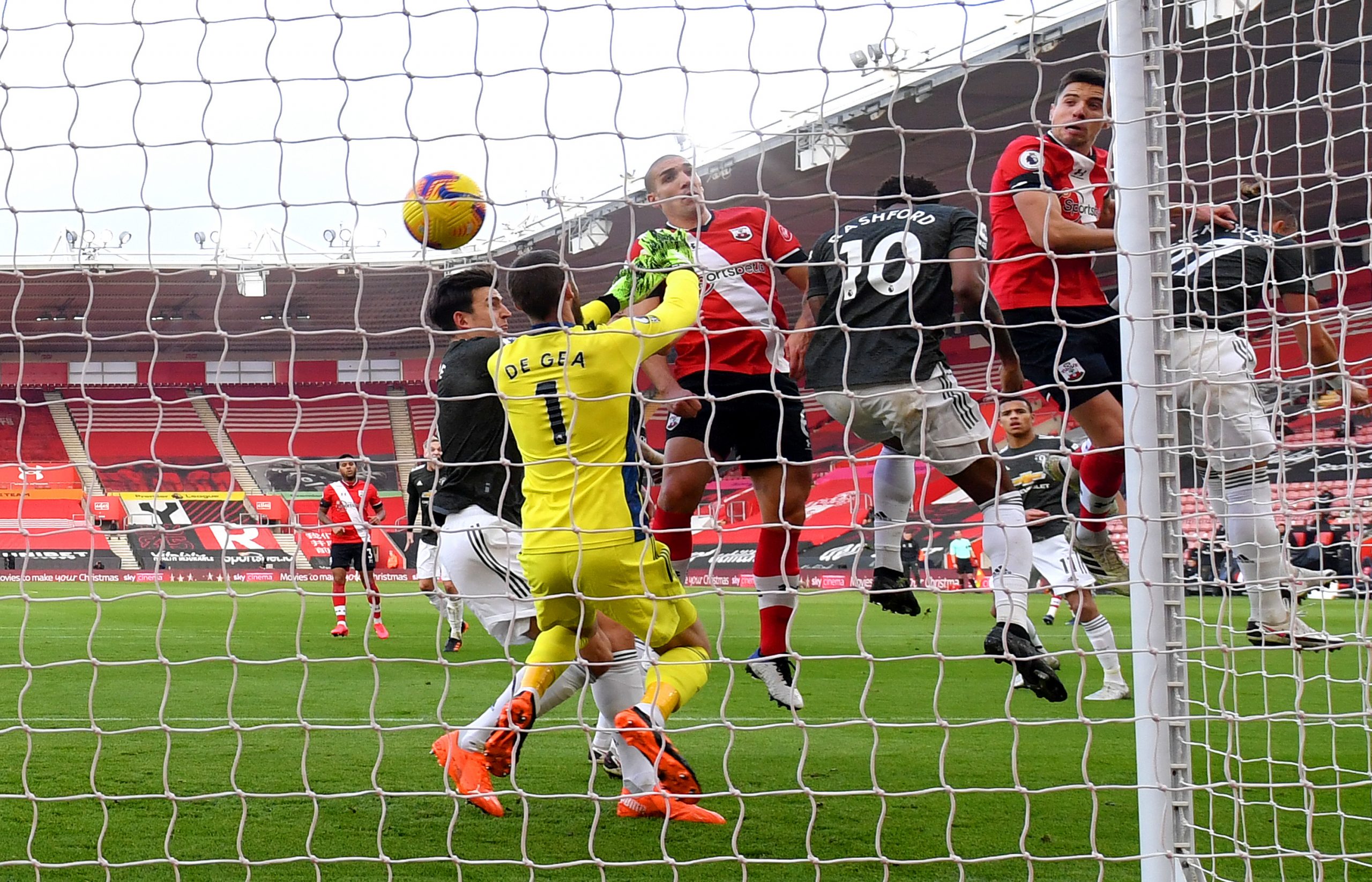 Jan Bednarek of Southampton (R) scores their team's first goal past David De Gea of Manchester United during the Premier League match between Southampton and Manchester United at St Mary's Stadium on November 29, 2020 in Southampton, England. Sporting stadiums around the UK remain under strict restrictions due to the Coronavirus Pandemic as Government social distancing laws prohibit fans inside venues resulting in games being played behind closed doors. (Photo by Mike Hewitt/Getty Images)