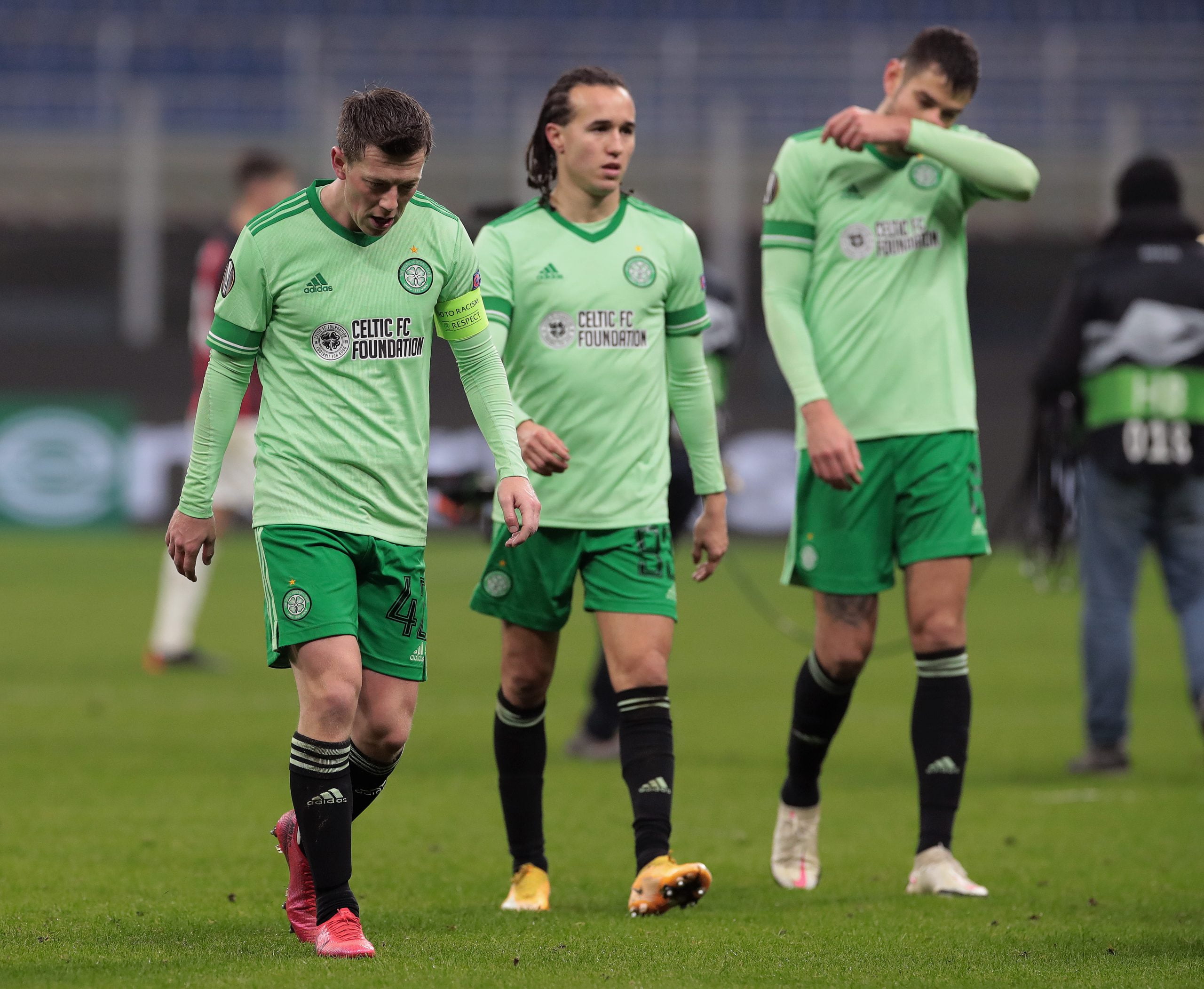 MILAN, ITALY - DECEMBER 03: (L-R) Callum McGregor, Diego Laxalt and Nir Bitton of Celtic look dejected following their defeat in the UEFA Europa League Group H stage match between AC Milan and Celtic at San Siro Stadium on December 03, 2020 in Milan, Italy. Sporting stadiums around Italy remain under strict restrictions due to the Coronavirus Pandemic as Government social distancing laws prohibit fans inside venues resulting in games being played behind closed doors. (Photo by Emilio Andreoli/Getty Images)