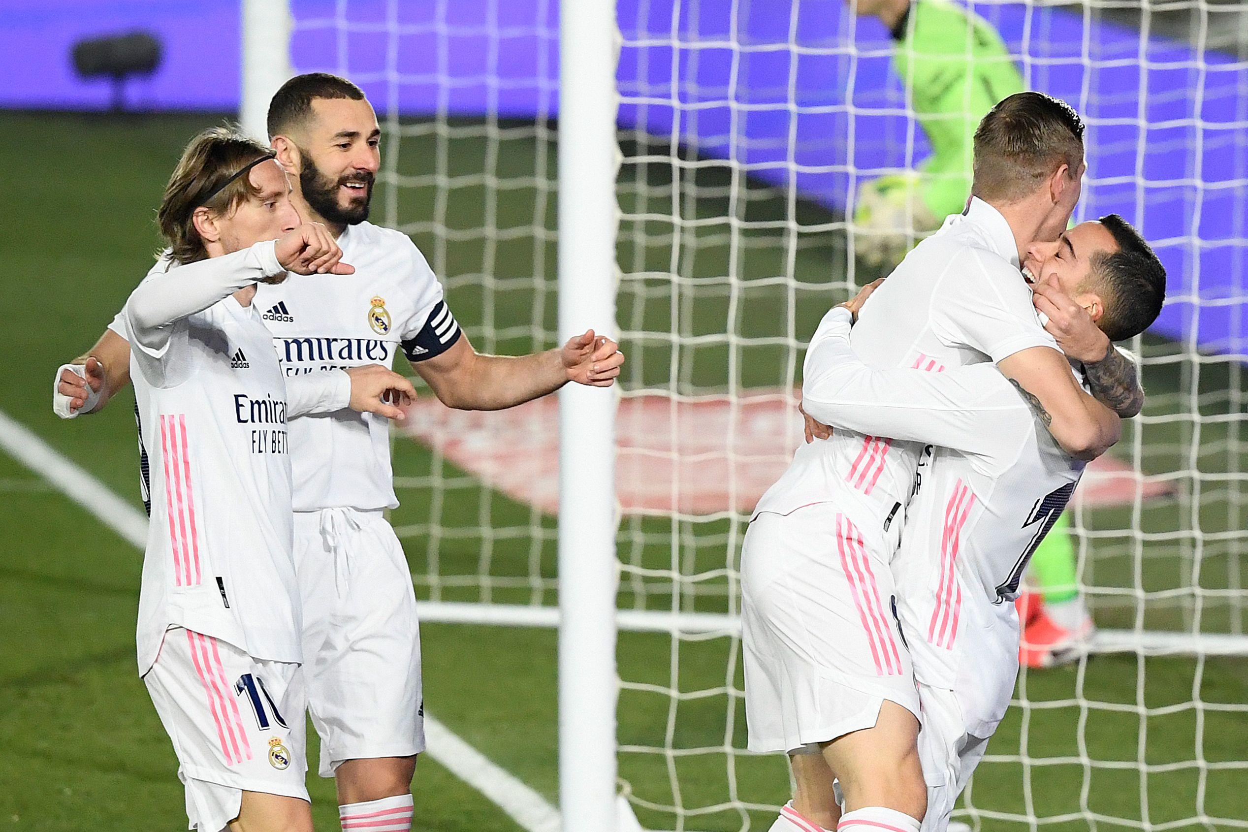 Real Madrid's Spanish forward Lucas Vazquez (R) celebrates with teammates after scoring a goal during the Spanish League football match between Real Madrid and Celta Vigo at the Alfredo Di Stefano stadium in Valdebebas, northeast of Madrid, on January 2, 2021. (Photo by OSCAR DEL POZO / AFP) (Photo by OSCAR DEL POZO/AFP via Getty Images)