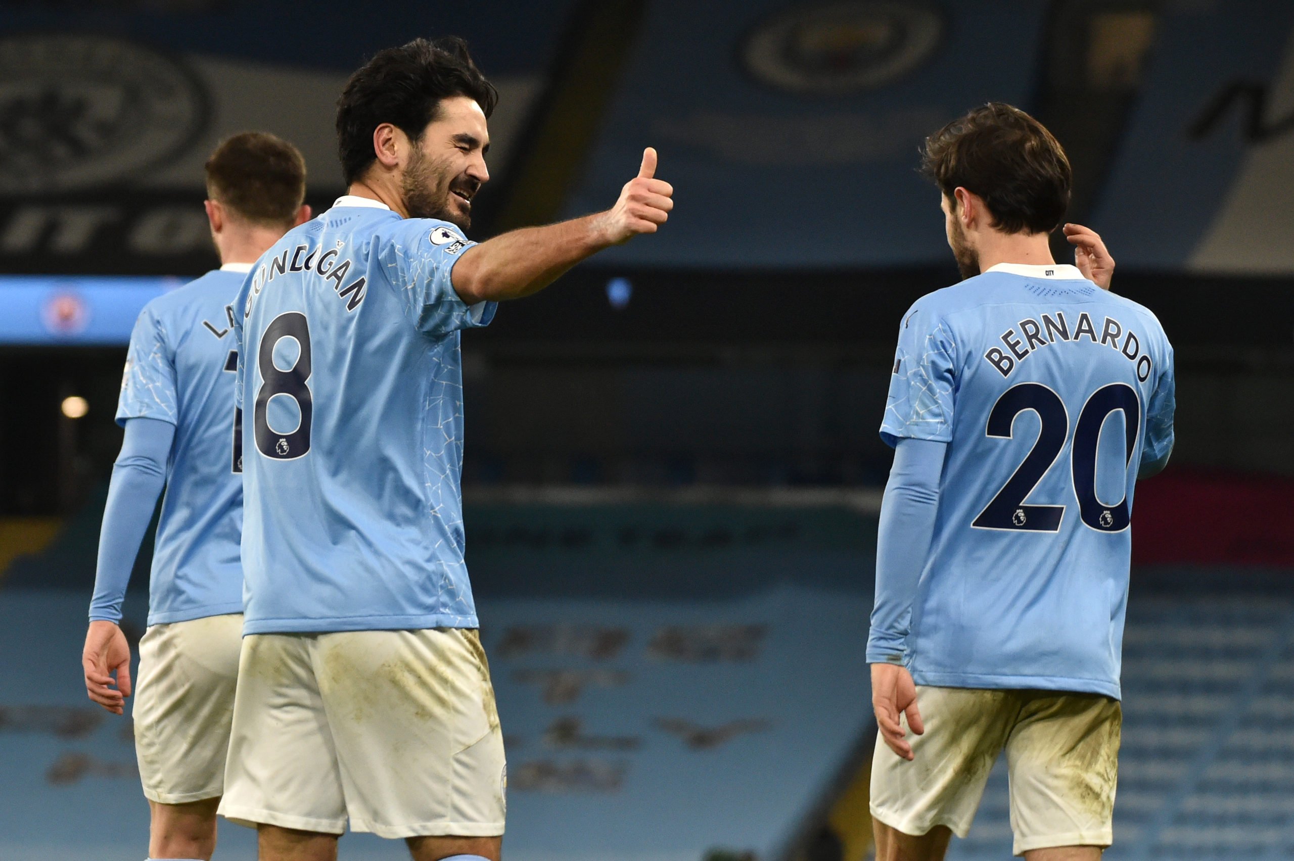 4-3-3 Manchester City Predicted Lineup Vs Wolves (Man City players are celebrating in the photo)