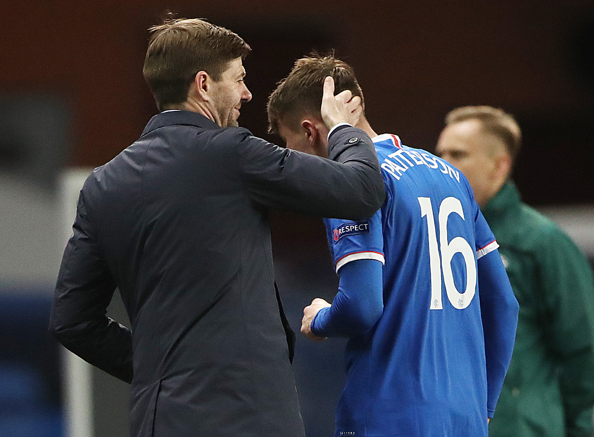 GLASGOW, SCOTLAND - FEBRUARY 25: Rangers Manager Steven Gerrard is seen with Nathan Patterson during the UEFA Europa League Round of 32 match between Rangers FC and Royal Antwerp FC at  on February 25, 2021 in Glasgow, Scotland. Sporting stadiums around the UK remain under strict restrictions due to the Coronavirus Pandemic as Government social distancing laws prohibit fans inside venues resulting in games being played behind closed doors. (Photo by Ian MacNicol/Getty Images)
