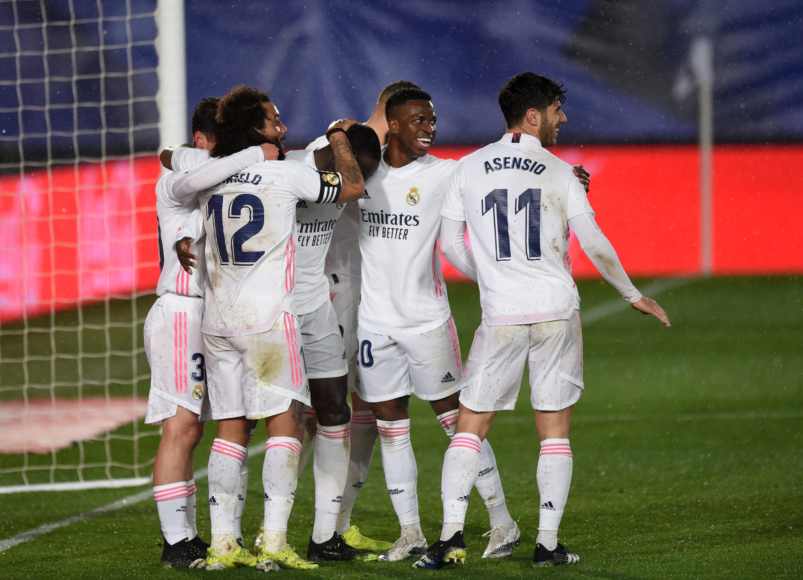 MADRID, SPAIN - FEBRUARY 09: Ferland Mendy of Real Madrid celebrates with teammates after scoring their team's second goal during the La Liga Santander match between Real Madrid and Getafe CF at Estadio Alfredo Di Stefano on February 09, 2021 in Madrid, Spain. Sporting stadiums around Spain remain under strict restrictions due to the Coronavirus Pandemic as Government social distancing laws prohibit fans inside venues resulting in games being played behind closed doors. (Photo by Denis Doyle/Getty Images)