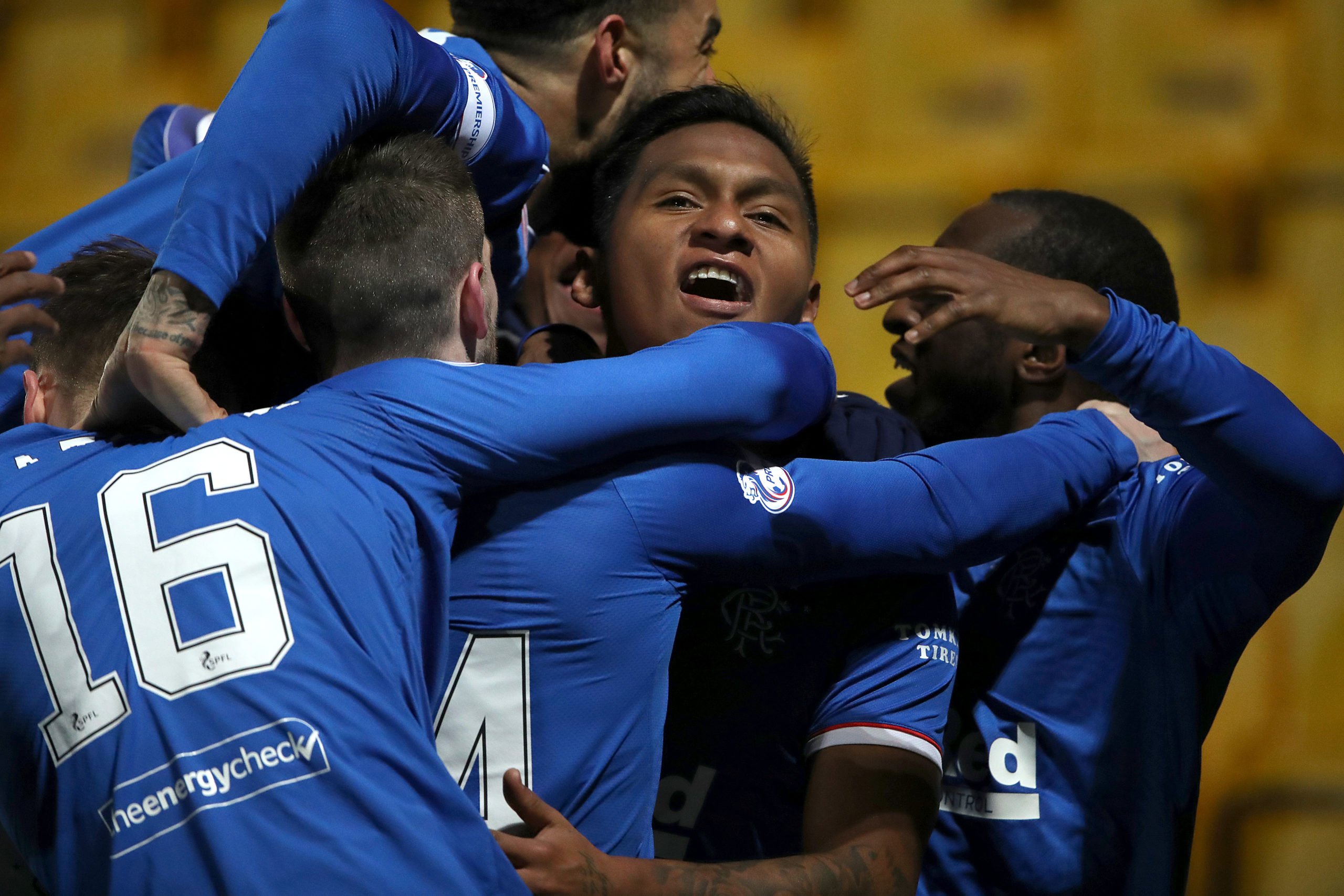 LIVINGSTON, SCOTLAND - MARCH 03: Alfredo Morelos of Rangers celebrates with team mates after scoring their side's first goal during the Ladbrokes Scottish Premiership match between Livingston and Rangers at Tony Macaroni Arena on March 03, 2021 in Livingston, Scotland. Sporting stadiums around the UK remain under strict restrictions due to the Coronavirus Pandemic as Government social distancing laws prohibit fans inside venues resulting in games being played behind closed doors. (Photo by Ian MacNicol/Getty Images)