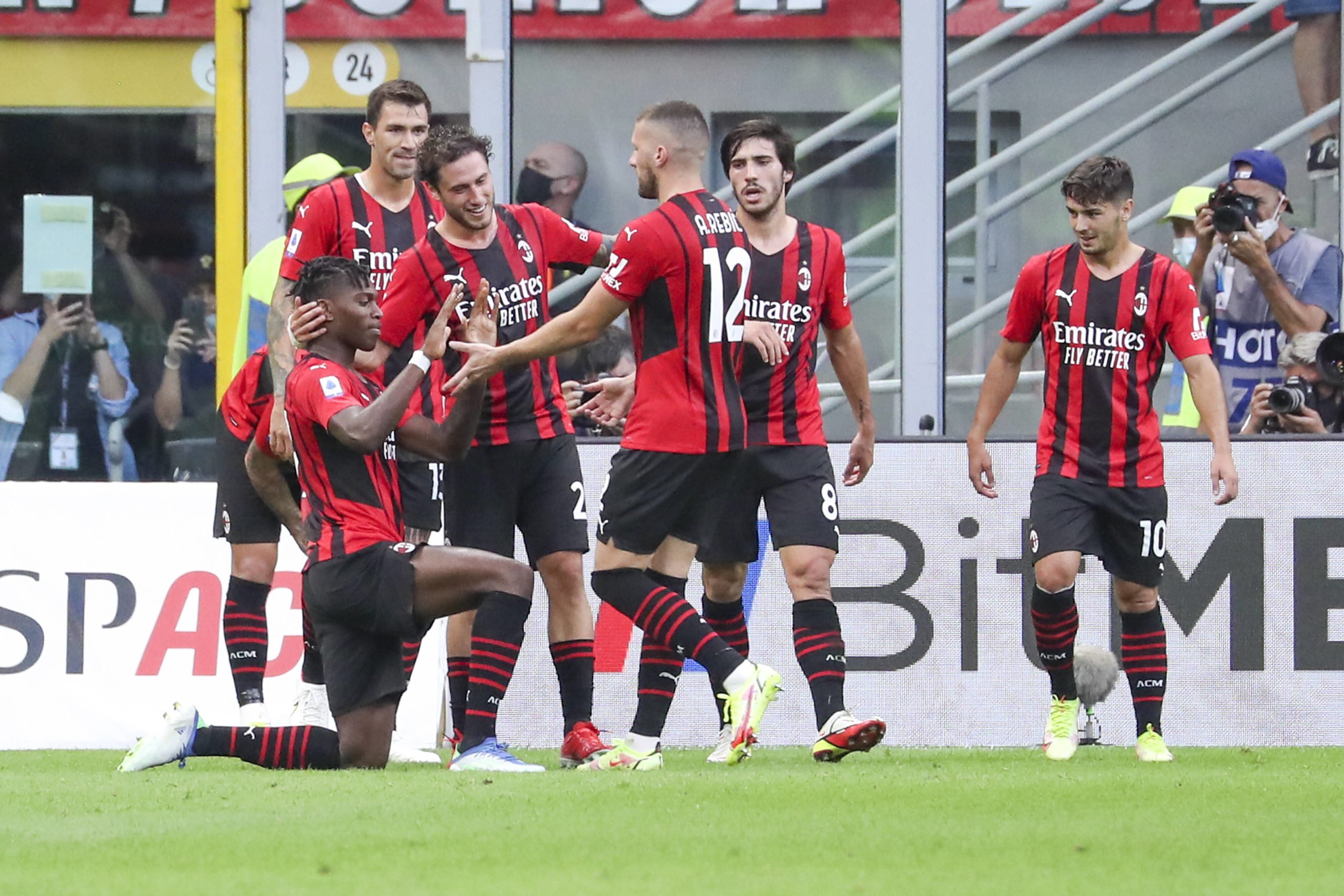 AC Milan players celebrating a goal against Lazio 