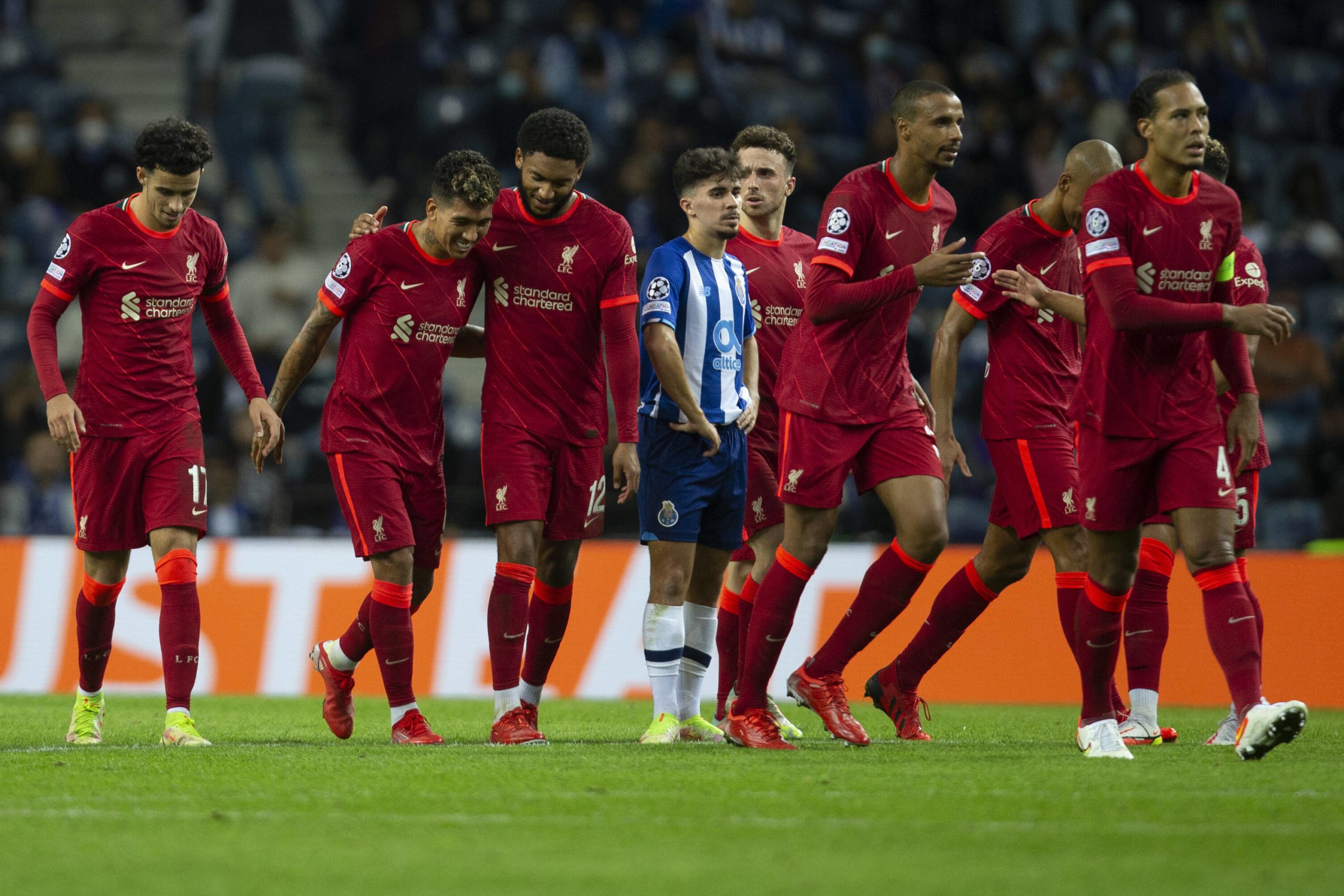 Liverpool player ratings vs FC Porto (Liverpool players are celebrating in the photo)