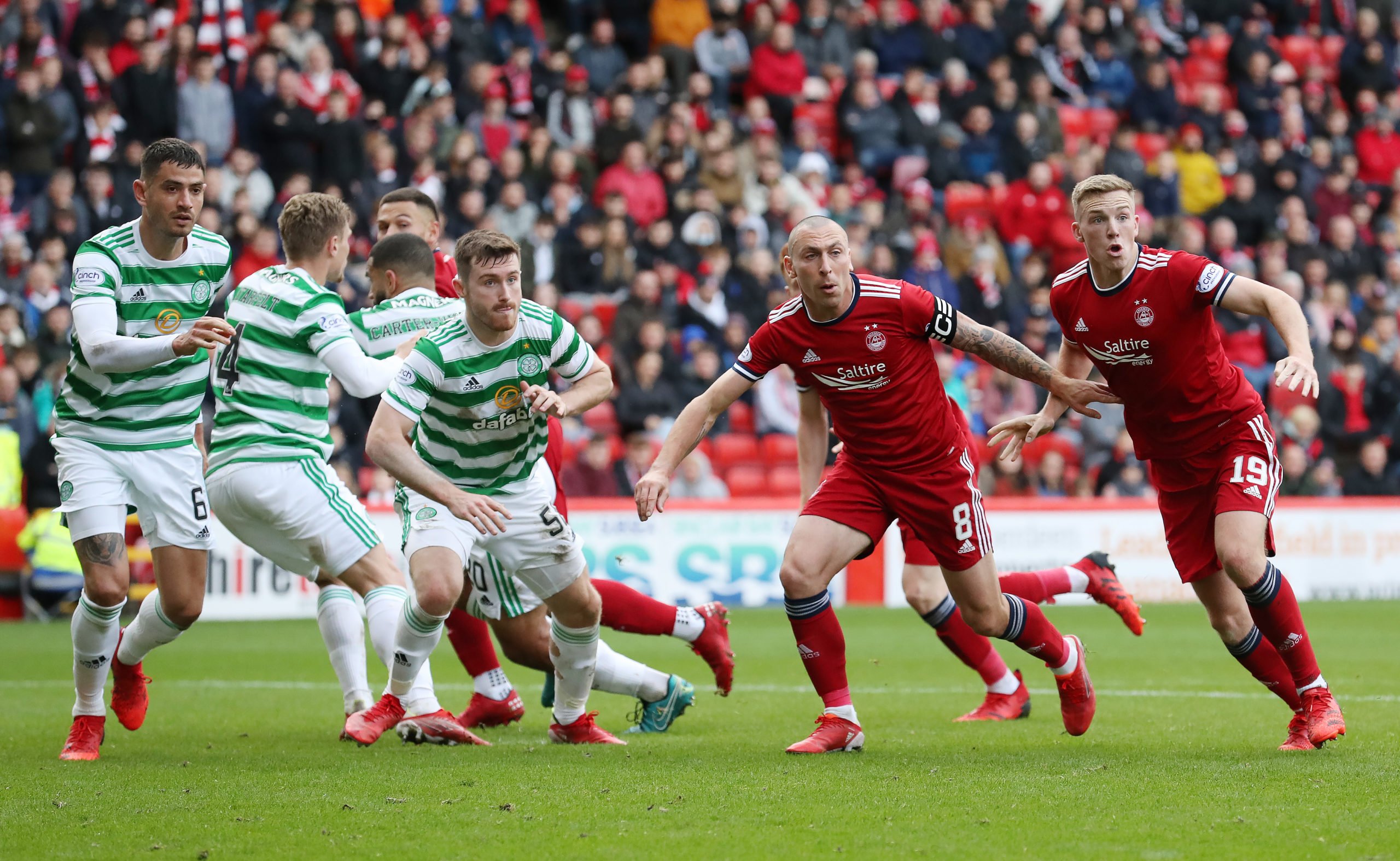 Celtic players in action against Aberdeen
