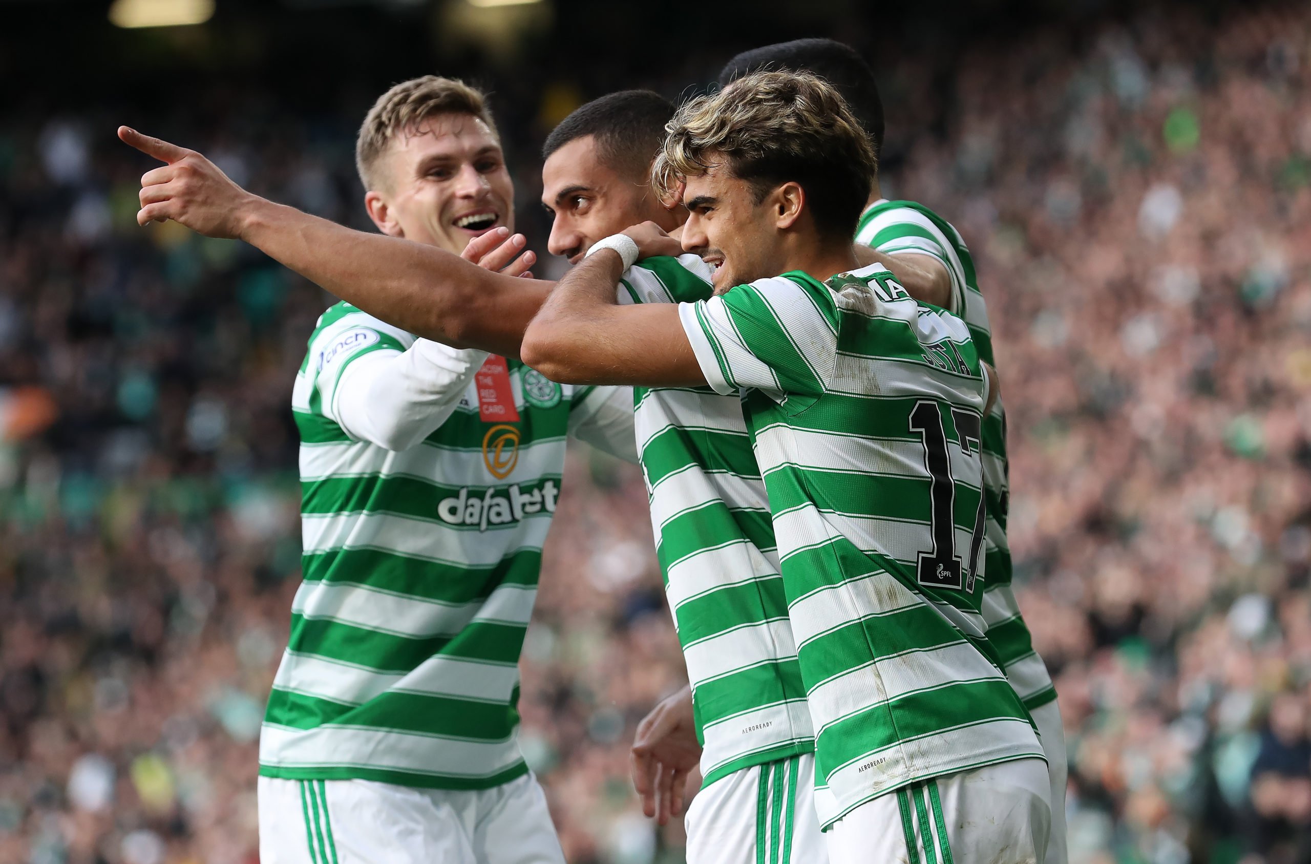 Celtic players celebrates a goal