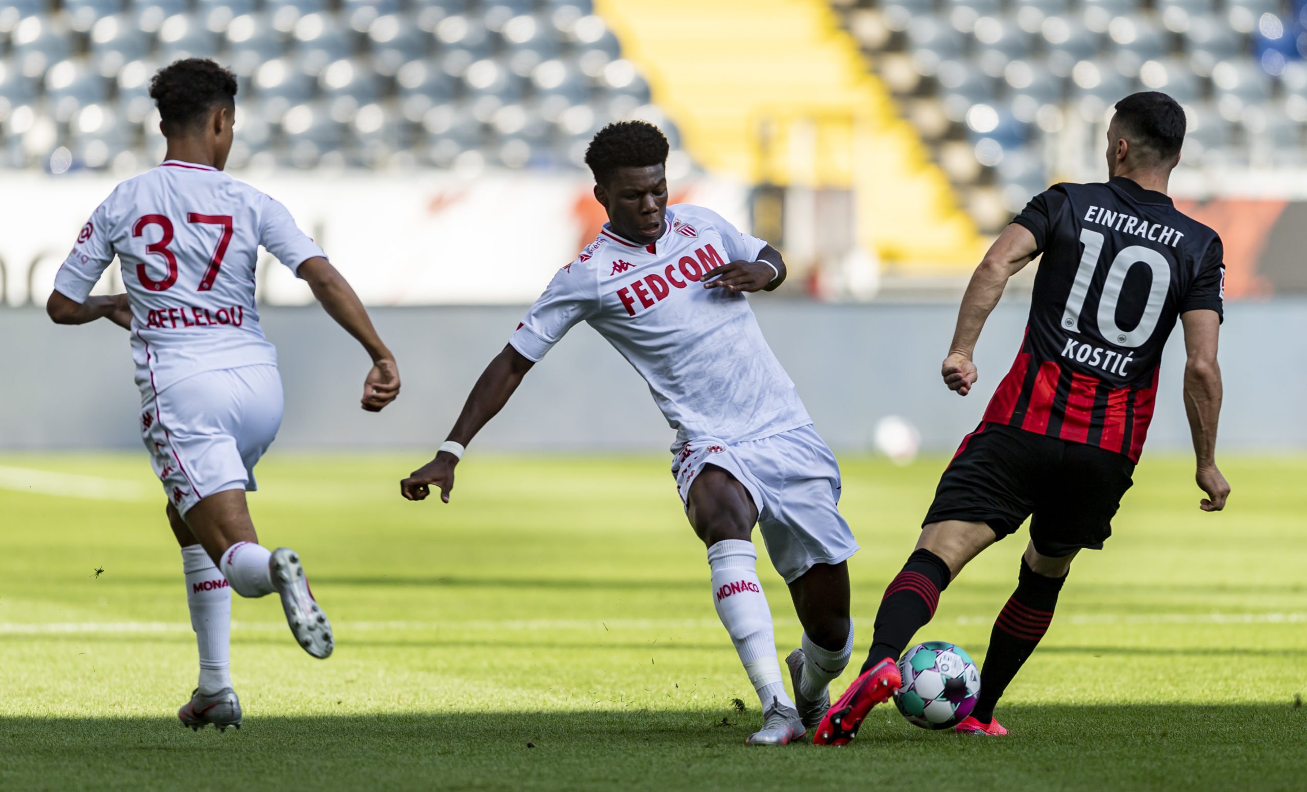 FRANKFURT AM MAIN, GERMANY - AUGUST 01: Aurelien Tchouameni of Monaco in action against Filip Kostic of Frankfurt during the friendly match between Eintracht Frankfurt and AS Monaco at Deutsche Bank Park on August 01, 2020 in Frankfurt am Main, Germany. (Photo by Alexander Scheuber/Getty Images)The 4th Official uses images provided by the following image agency: Getty Images (https://www.gettyimages.de/) Imago Images (https://www.imago-images.de/)