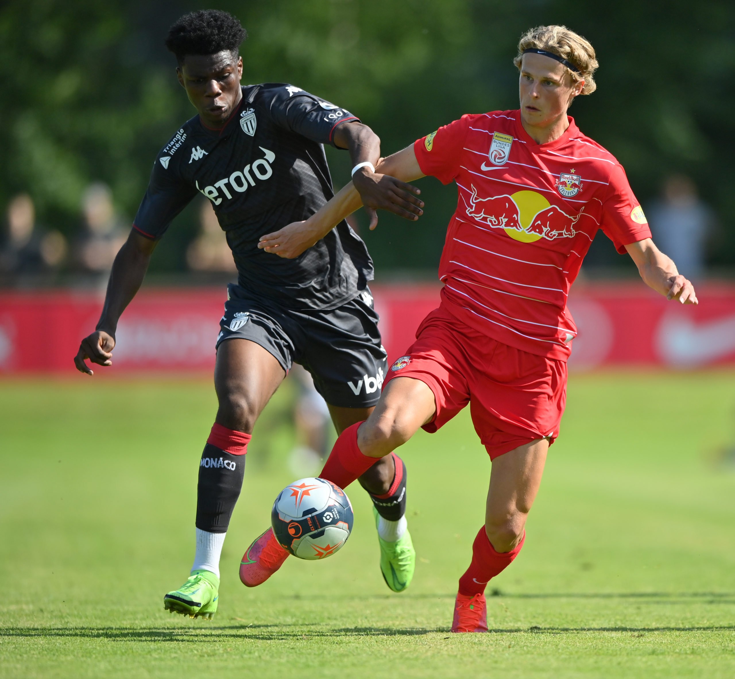 ANIF, AUSTRIA - JULY 03: Aurelien Tchouameni of AS Monaco and Maurits Kjaergaard of FC Red Bull Salzburg compete for the ball  during the Pre-Season Friendly match between FC Red Bull Salzburg and AS Monaco at Maximarkt Sportpark on July 03, 2021 in Anif, Austria. (Photo by Sebastian Widmann/Getty Images)The 4th Official uses images provided by the following image agency: Getty Images (https://www.gettyimages.de/) Imago Images (https://www.imago-images.de/)