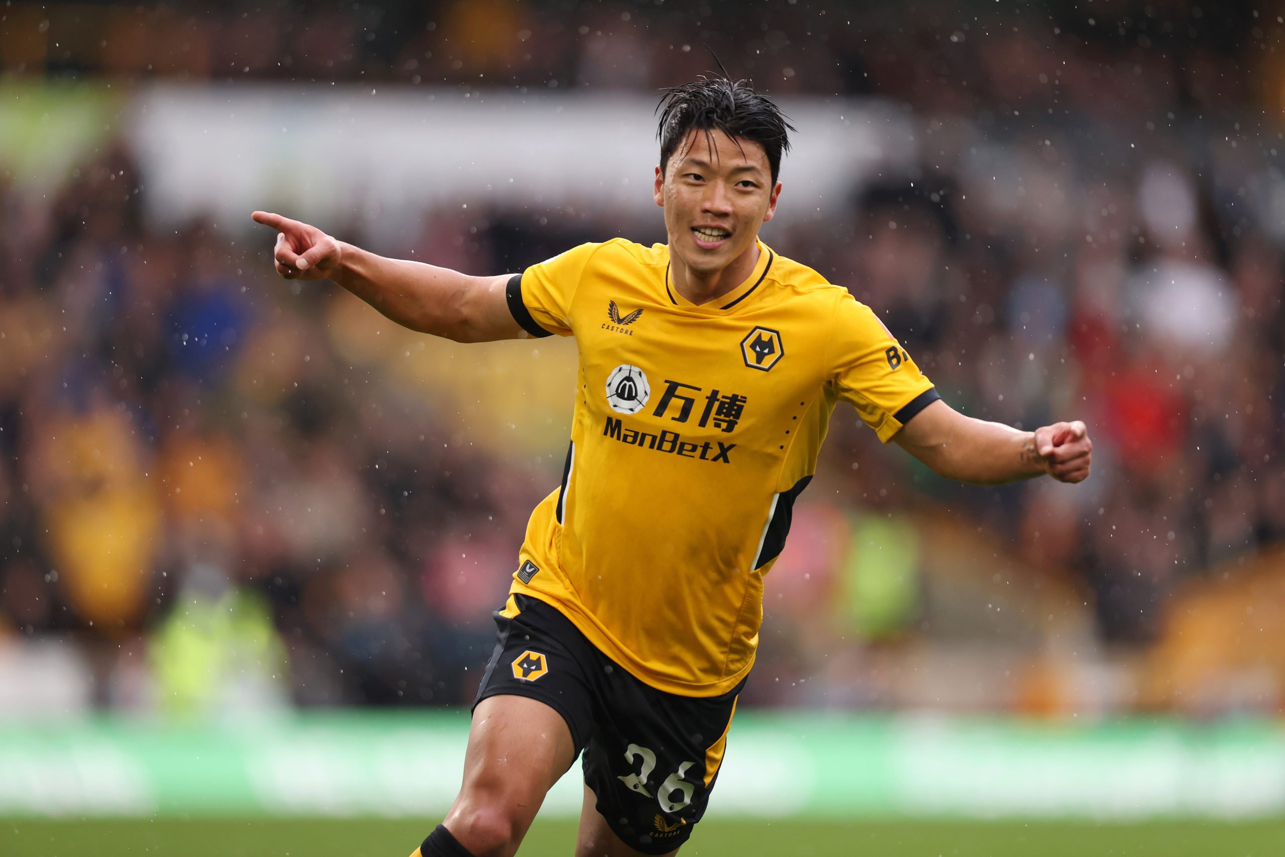 WOLVERHAMPTON, ENGLAND - OCTOBER 02: Hwang Hee-chan of Wolverhampton Wanderers celebrates after scoring their team's second goal during the Premier League match between Wolverhampton Wanderers and Newcastle United at Molineux on October 02, 2021 in Wolverhampton, England. (Photo by Naomi Baker/Getty Images)The 4th Official uses images provided by the following image agency: Getty Images (https://www.gettyimages.de/) and Imago Images (https://www.imago-images.de/)